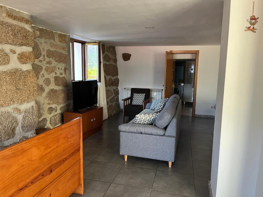 TV a/nebo společenská místnost v ubytování Casa da Lage - Piscina privada - Gerês
