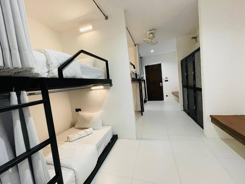 Postel nebo postele na pokoji v ubytování Koh Samui Beach Hotel
