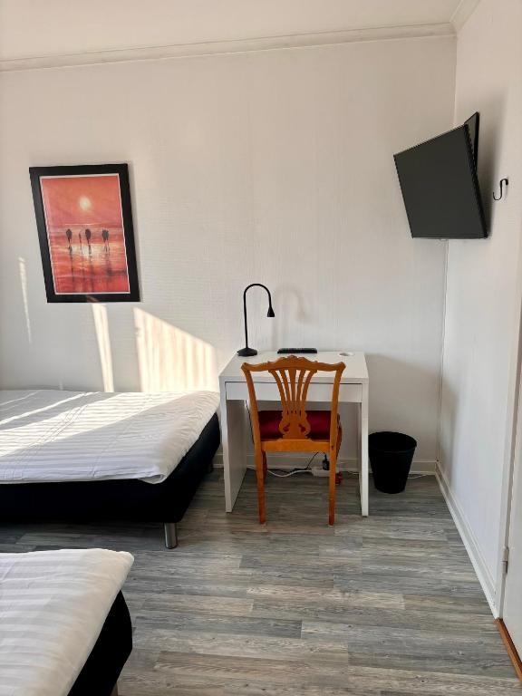 Postel nebo postele na pokoji v ubytování Villa söder om Varberg