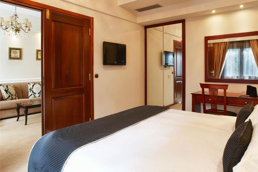 TV a/nebo společenská místnost v ubytování Ava Hotel and Suites