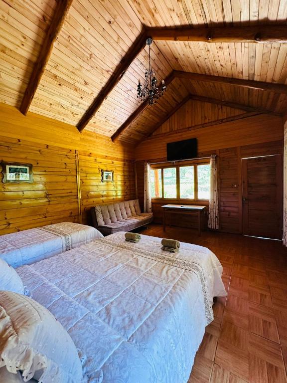 Voodi või voodid majutusasutuse HASSINGER RANCH Cabañas toas