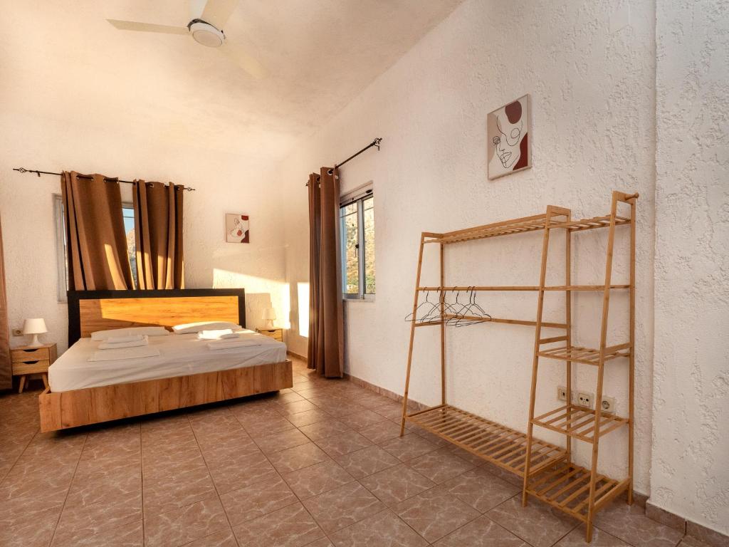 Postel nebo postele na pokoji v ubytování Villa Dirui