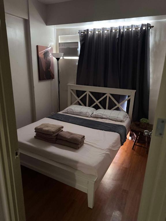 Postel nebo postele na pokoji v ubytování Vittoria Suites at Northpoint Pines Estate