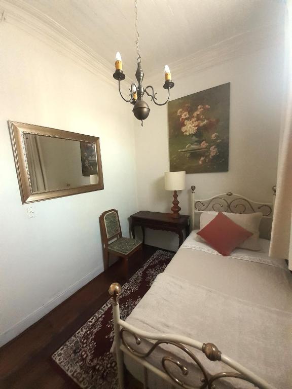 Postel nebo postele na pokoji v ubytování Casa dos Leones