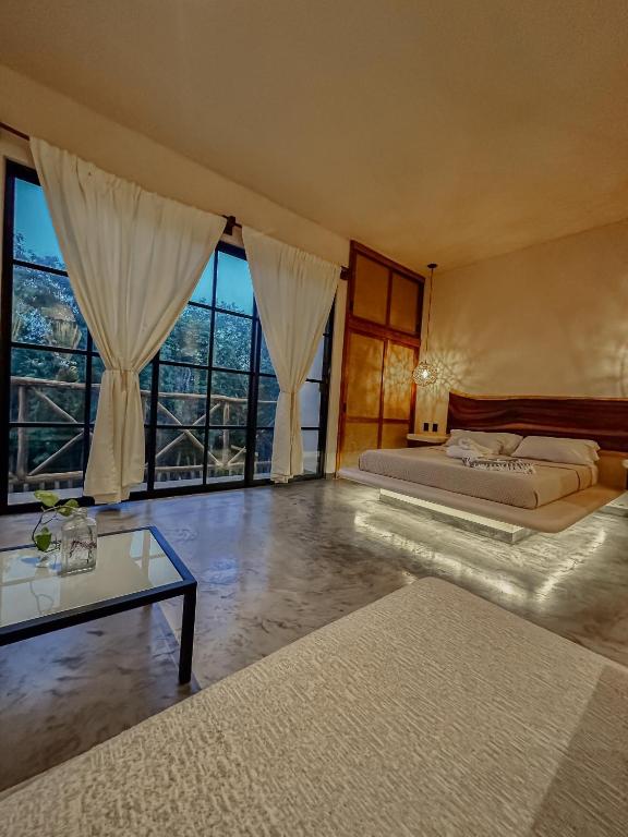 Postel nebo postele na pokoji v ubytování Casa Kobaab Tulum