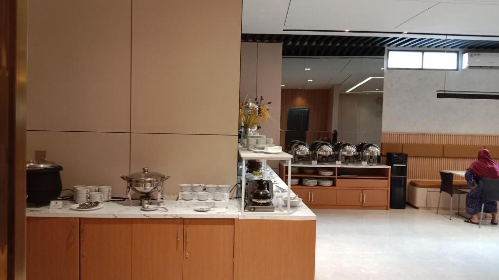 Cucina o angolo cottura di Laxston Hotel
