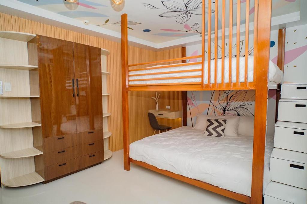 Postel nebo postele na pokoji v ubytování N Residences
