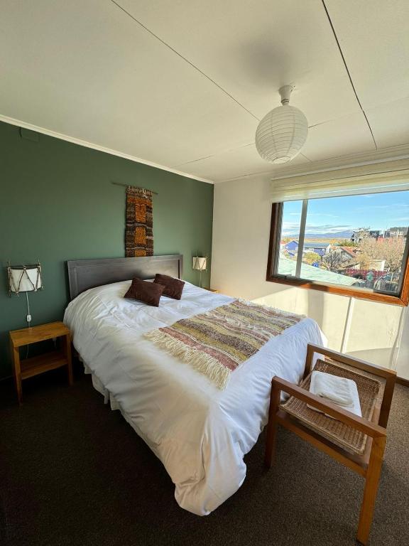 Postel nebo postele na pokoji v ubytování Hostal Amerindia