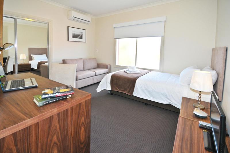 Postel nebo postele na pokoji v ubytování 4C- Executive Rooms in Premium Shared Accommodation
