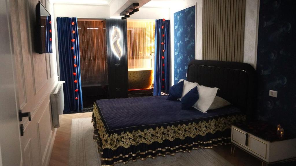 Ένα ή περισσότερα κρεβάτια σε δωμάτιο στο FancyLux Elegance Apartament