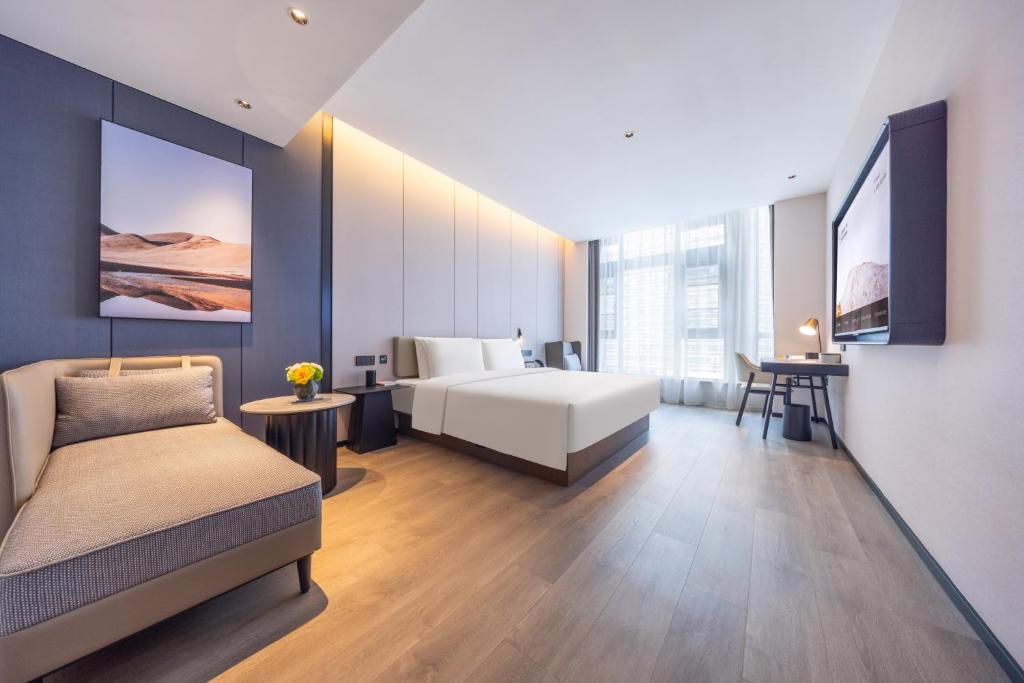 Postel nebo postele na pokoji v ubytování Atour Hotel Changsha Financial Center Chazishan Road