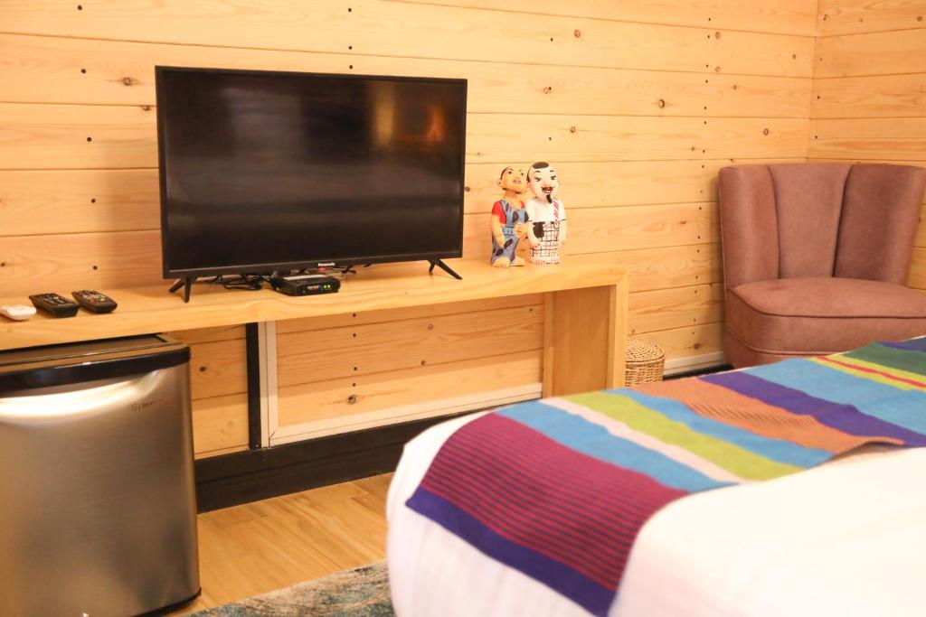 TV a/nebo společenská místnost v ubytování The Feel Luxury Boutique Hotel Ella
