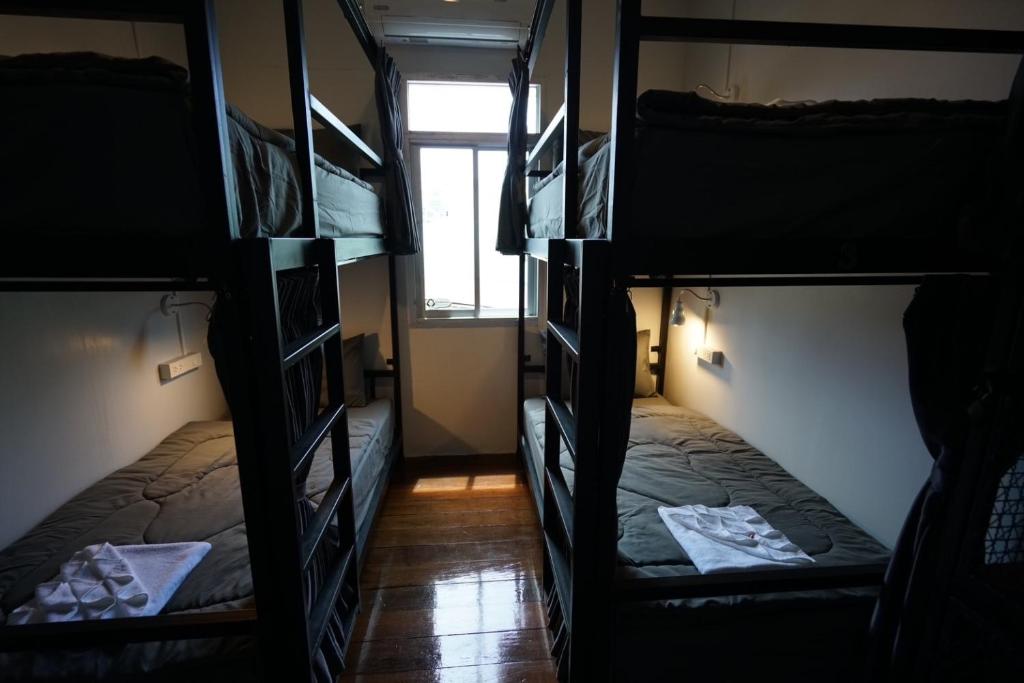 Postel nebo postele na pokoji v ubytování Amahostel