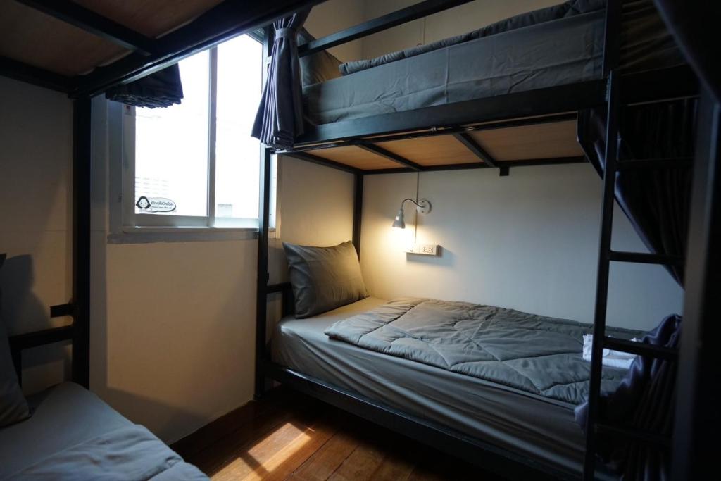 Postel nebo postele na pokoji v ubytování Amahostel