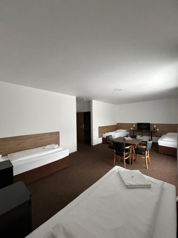 Postel nebo postele na pokoji v ubytování Motel R10