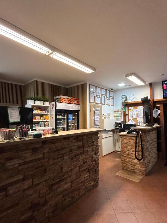 Kuchyň nebo kuchyňský kout v ubytování Motel R10