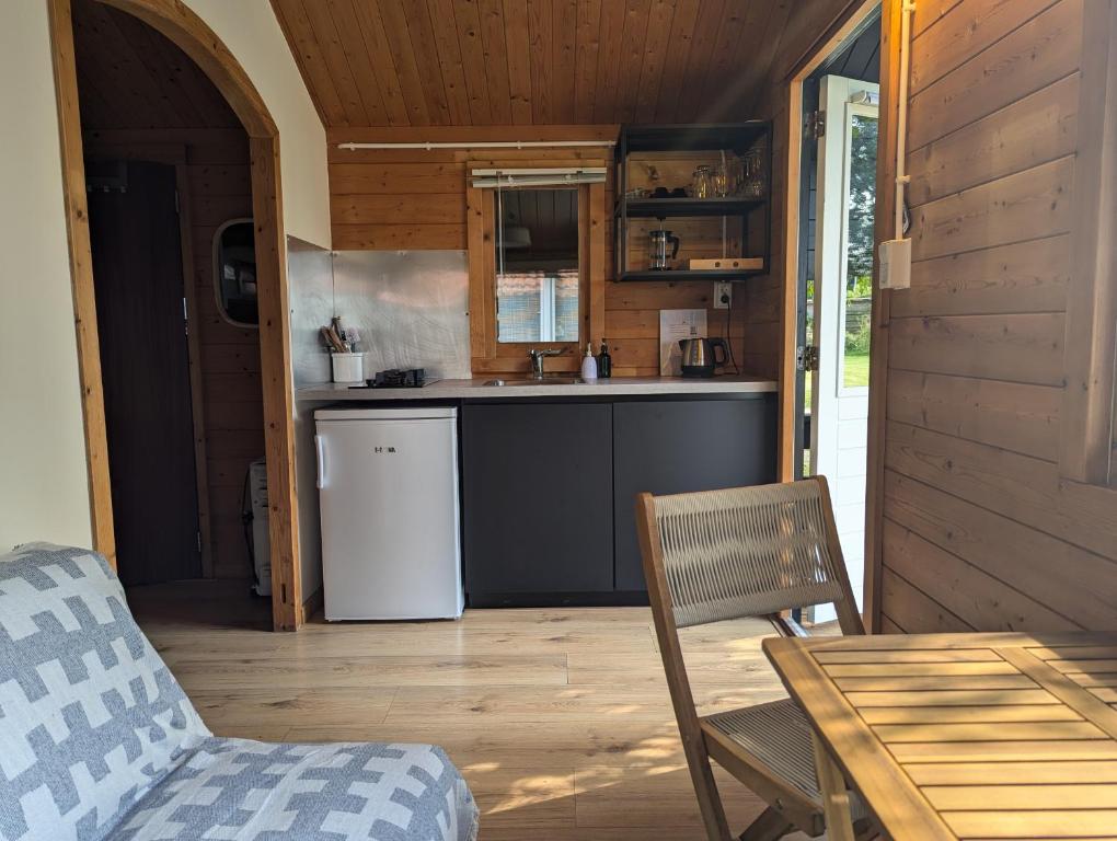 Kuchyň nebo kuchyňský kout v ubytování The Bee - Trekkershuts & Apartment