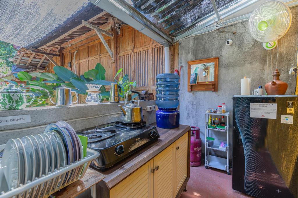Kuchyň nebo kuchyňský kout v ubytování Yukke Tembi Homestay