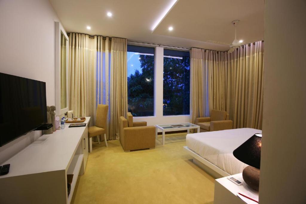 TV a/nebo společenská místnost v ubytování Mount Randholee Resorts & Spa