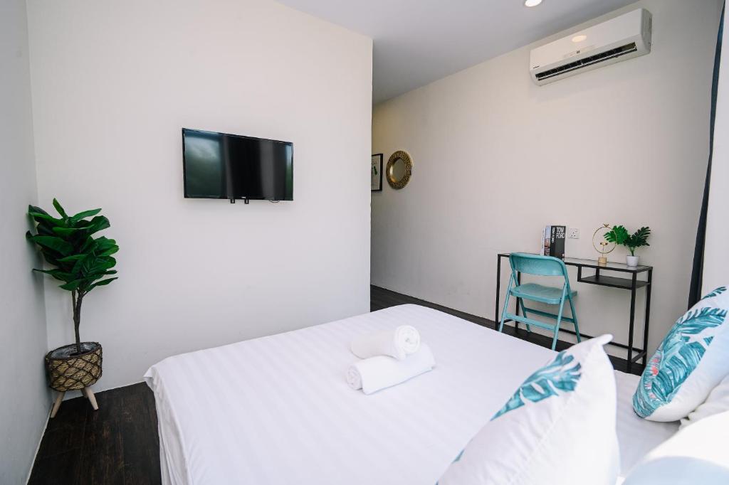 Postel nebo postele na pokoji v ubytování Swing & Pillows - Z Hotel Cyberjaya