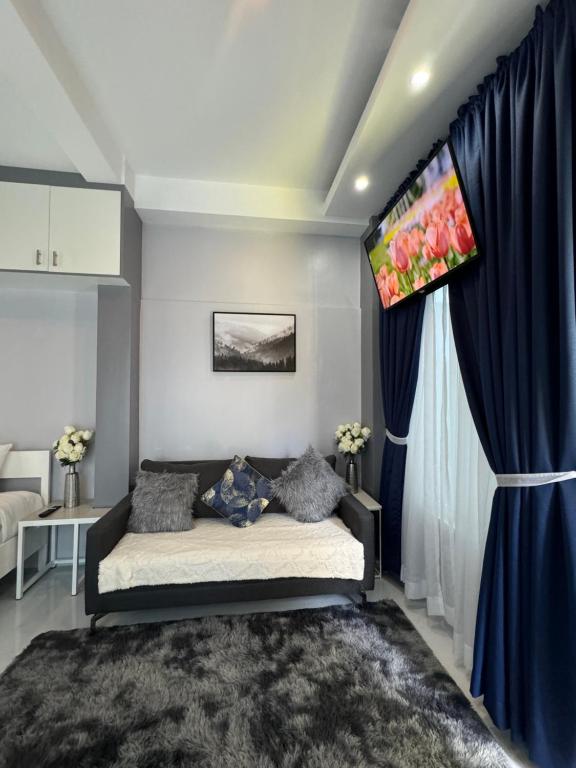Postel nebo postele na pokoji v ubytování Anavada Suites - Davao City