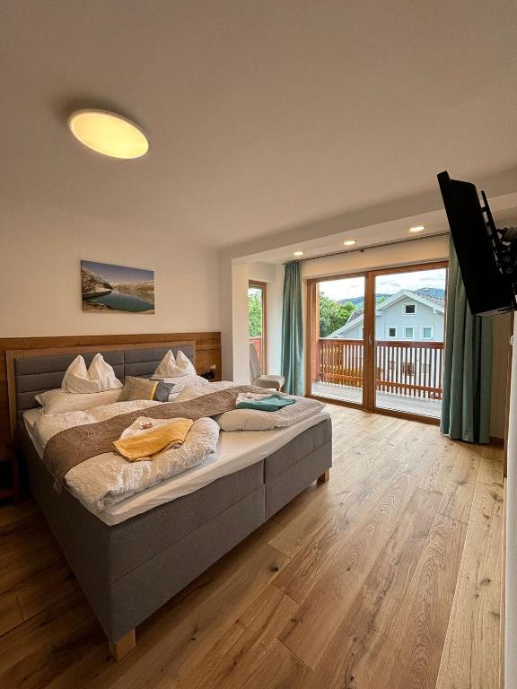 Postel nebo postele na pokoji v ubytování Gästehaus Bärwald