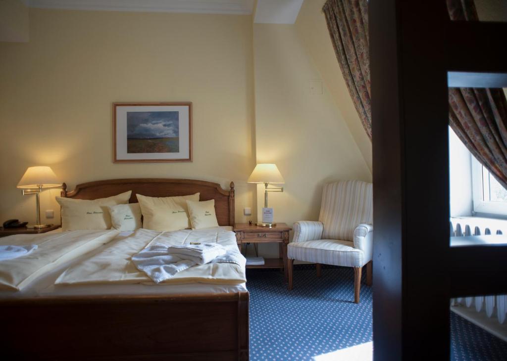 Postel nebo postele na pokoji v ubytování Haus Hainstein
