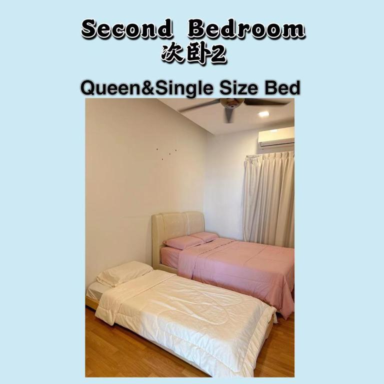 Postel nebo postele na pokoji v ubytování One Residence Sekinchan 适耕庄无敌海景