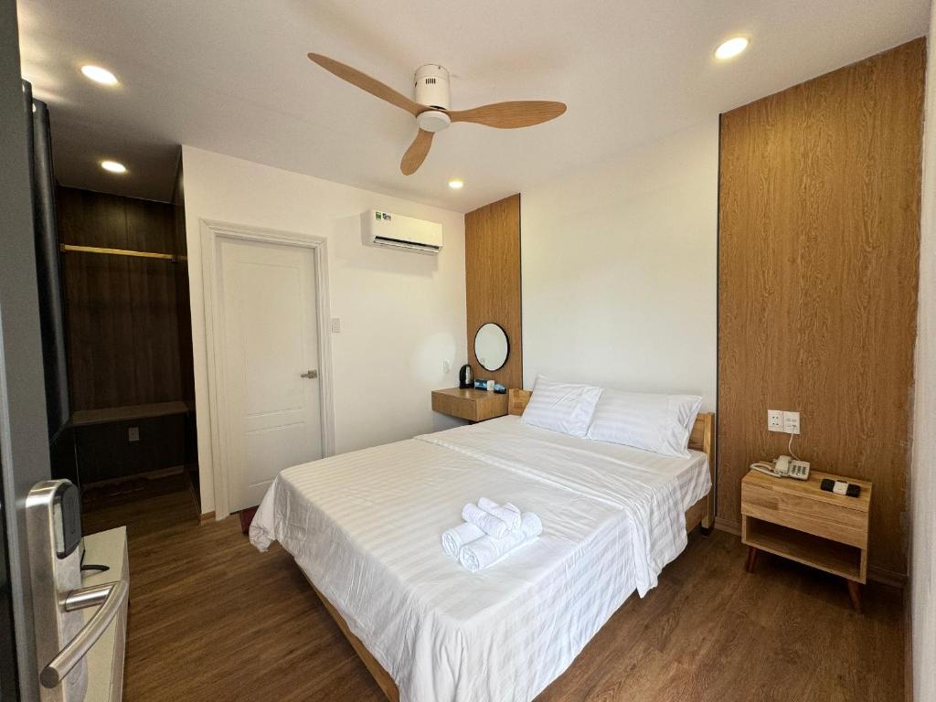 Postel nebo postele na pokoji v ubytování Wanderlust garden inn