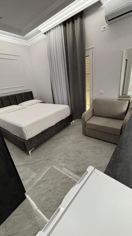 Postel nebo postele na pokoji v ubytování Bar Restorant Hotel Rama