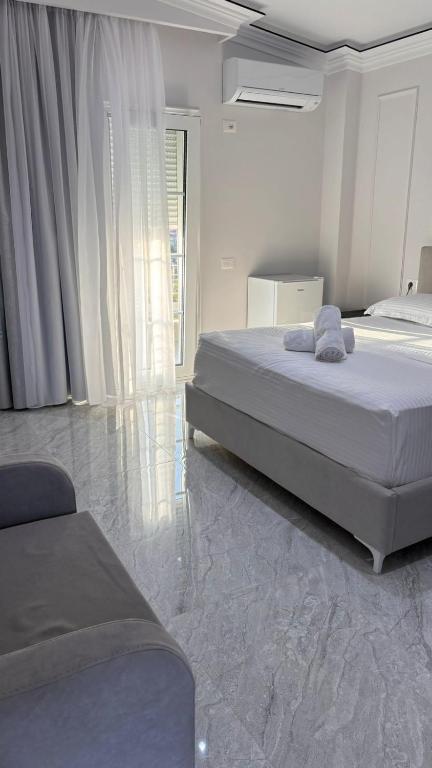 Postel nebo postele na pokoji v ubytování Bar Restorant Hotel Rama