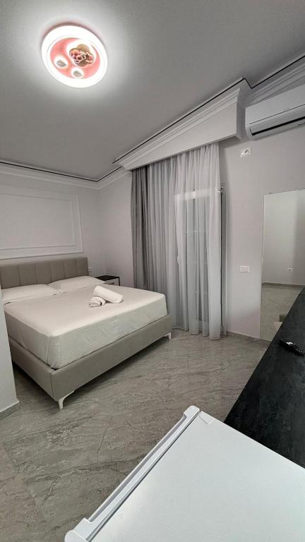 Postel nebo postele na pokoji v ubytování Bar Restorant Hotel Rama