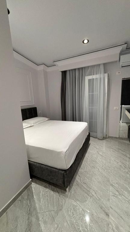 Postel nebo postele na pokoji v ubytování Bar Restorant Hotel Rama