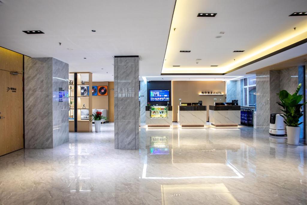 Vstupní hala nebo recepce v ubytování VX Hotel Shanghai Yixian Road Dabaishu