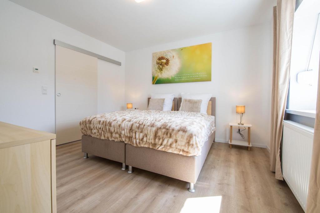 Ένα ή περισσότερα κρεβάτια σε δωμάτιο στο Luxury Zweibrücken 2