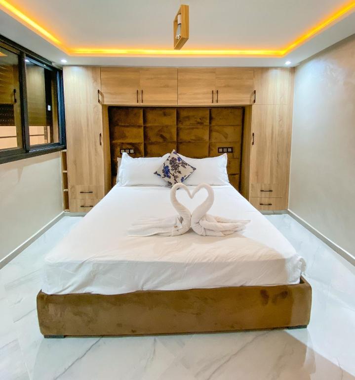 Postel nebo postele na pokoji v ubytování Appartment bades alhoceima