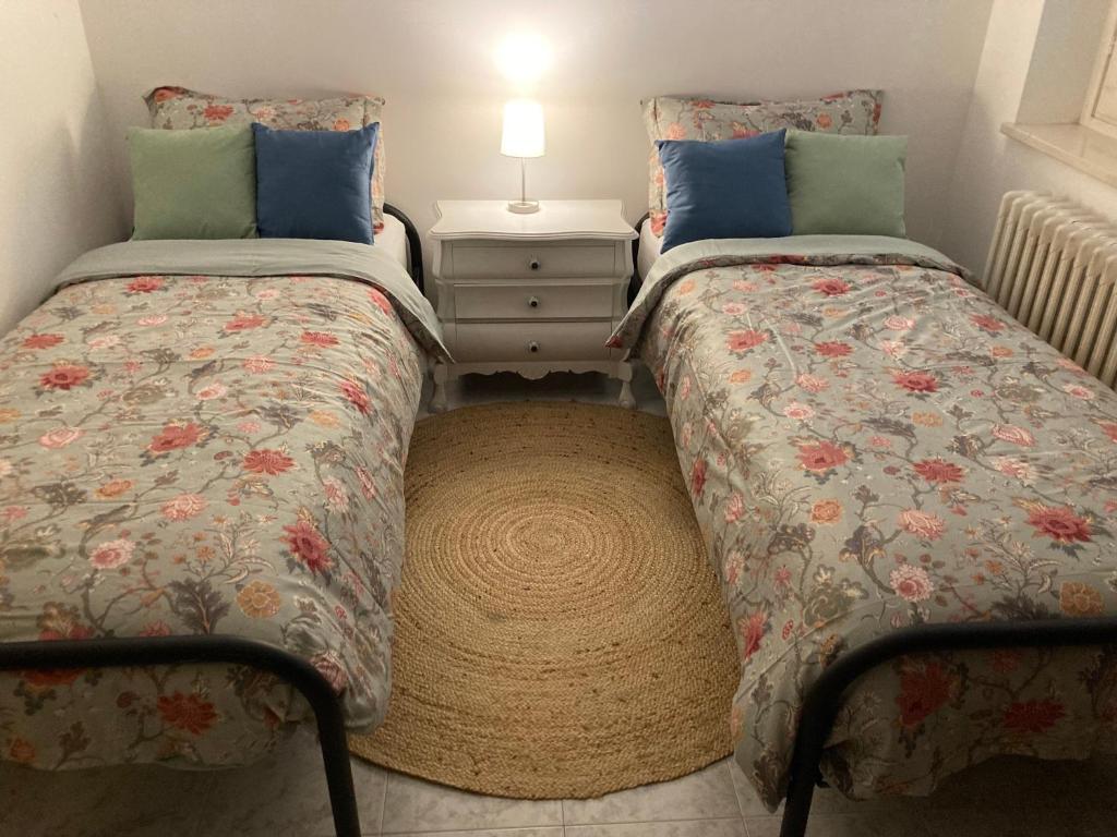 Postel nebo postele na pokoji v ubytování Casa Finestre Bianche