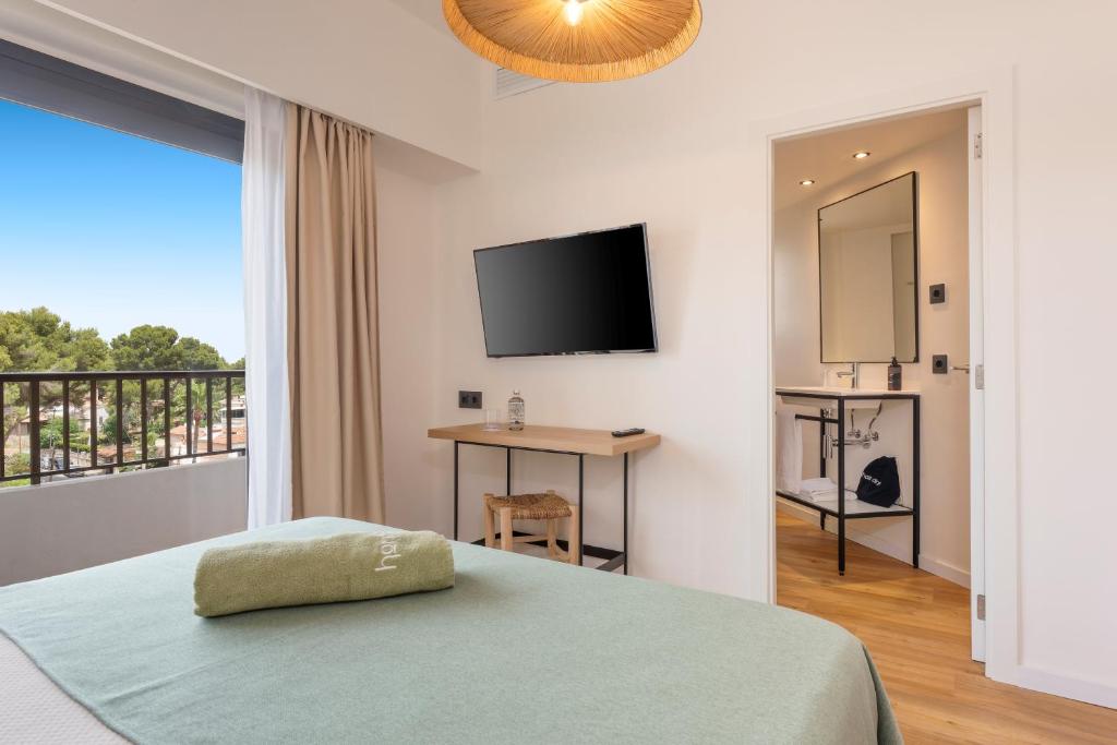 TV a/nebo společenská místnost v ubytování Copaiba by Honne Hotels - Adults Only