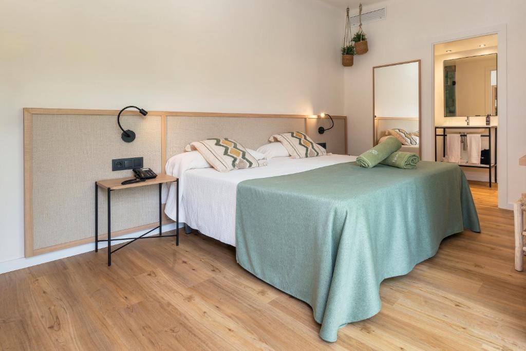 Postel nebo postele na pokoji v ubytování Copaiba by Honne Hotels - Adults Only