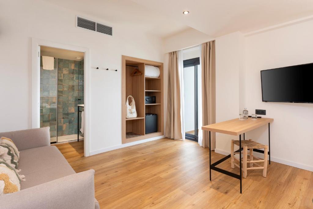 TV a/nebo společenská místnost v ubytování Copaiba by Honne Hotels - Adults Only