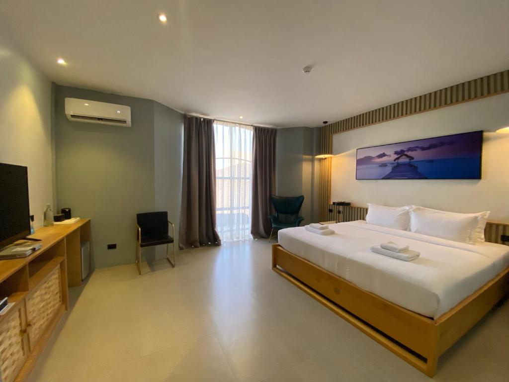 Postel nebo postele na pokoji v ubytování Only Seed Resort 欧芮希度假酒店