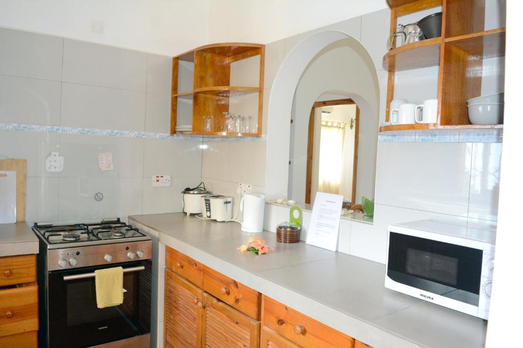 Kuchyň nebo kuchyňský kout v ubytování La Villa Therese