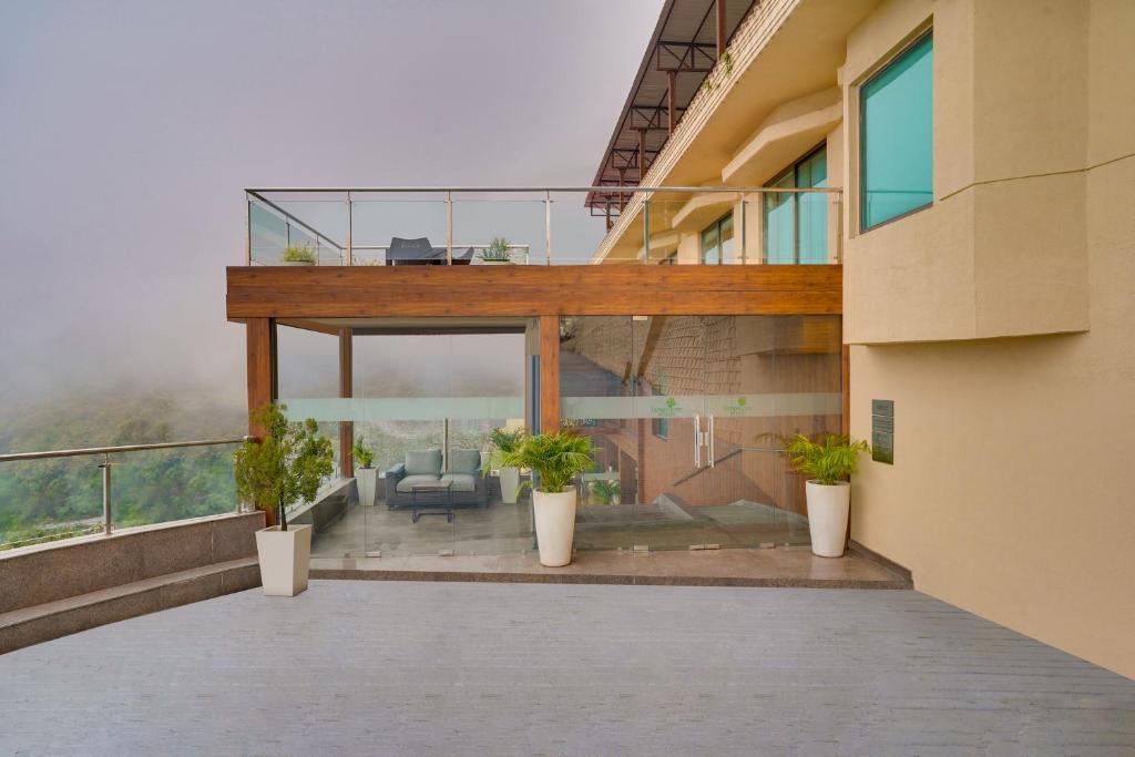 Balkón nebo terasa v ubytování Lemon Tree Resort, Mussoorie