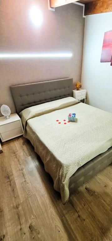 Łóżko lub łóżka w pokoju w obiekcie Luxury CASELLO 28 Affitti Brevi