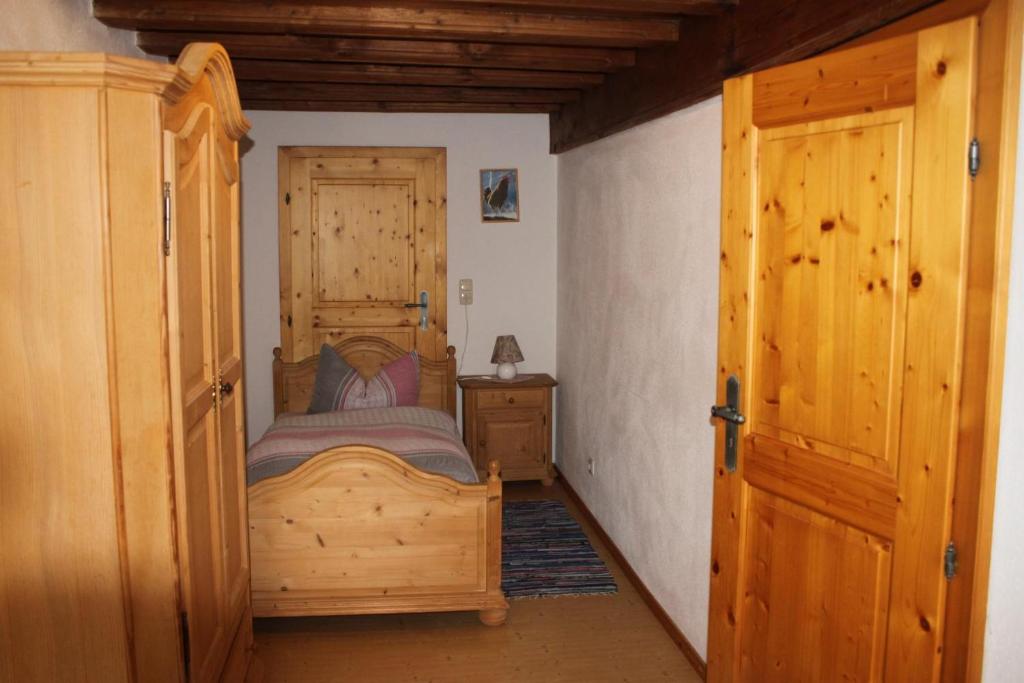 Postel nebo postele na pokoji v ubytování Ferienhof Aiginger