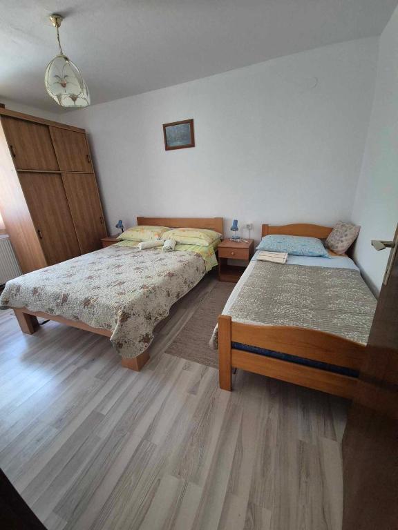 Postel nebo postele na pokoji v ubytování Guesthouse Milka