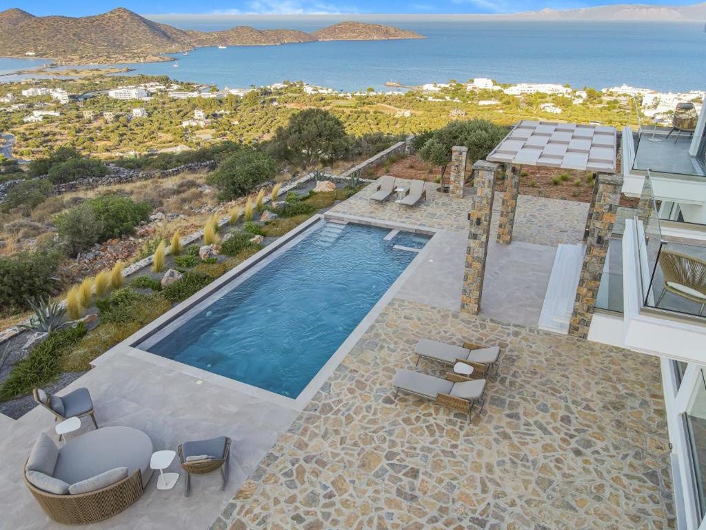 an aerial view of a villa with a swimming pool at Sole Mare Luxury Villa With Sea View & Private Pool in Elounda in Elounda