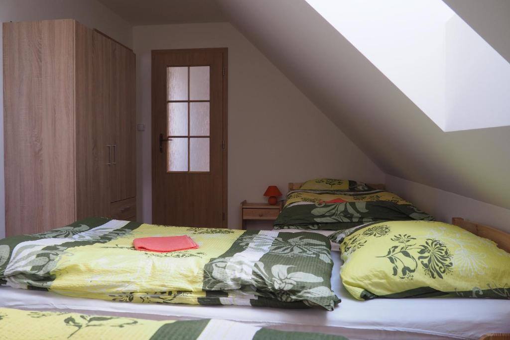 Postel nebo postele na pokoji v ubytování Ubytování Orlík