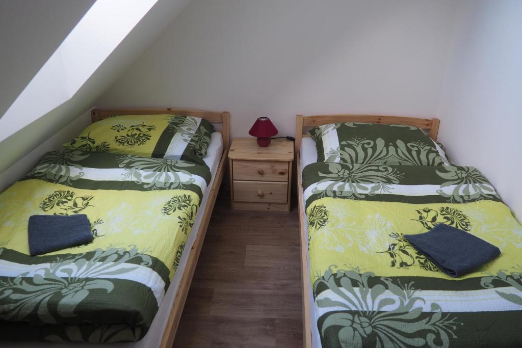 Postel nebo postele na pokoji v ubytování Ubytování Orlík