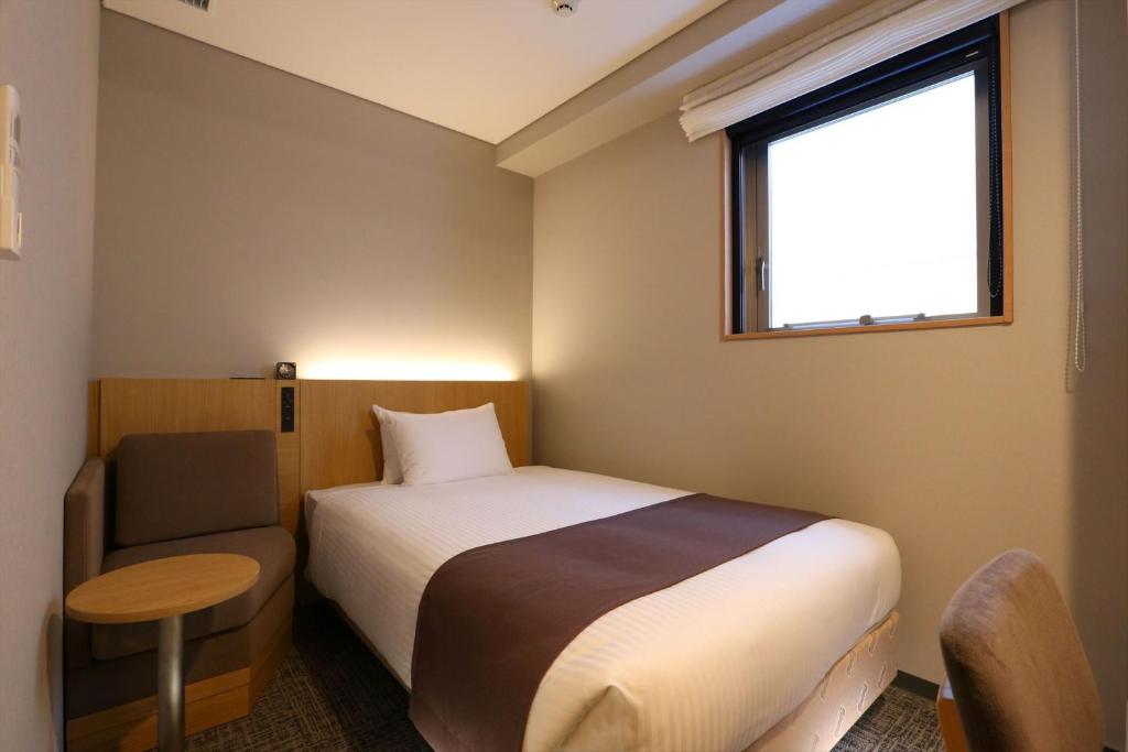 Postel nebo postele na pokoji v ubytování Almont Inn Shonan Fujisawa